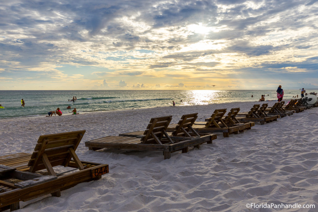 waterfront view of the beach, sunset