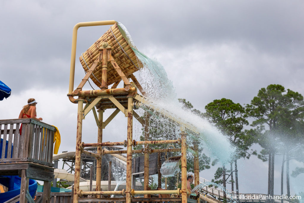 a giant bucket of water tipping over and pouring the water below at Shipwreck Island Waterpark