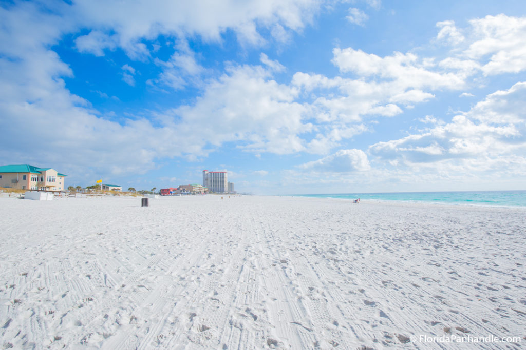 view of and empty beach with buildings in the background at Casino Beach in Florida