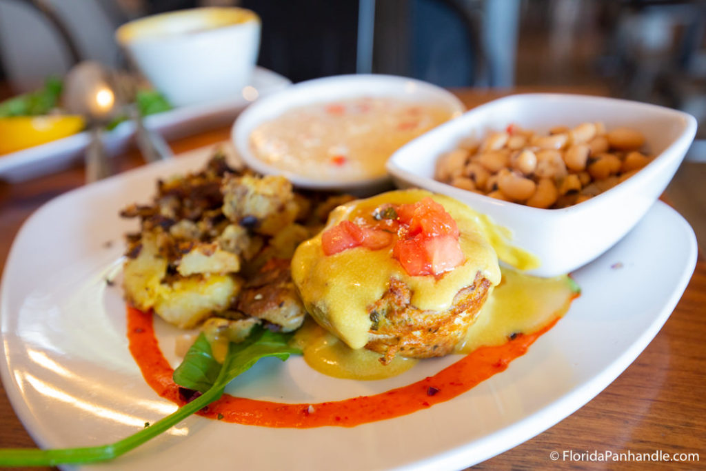 a plate of eggs with home fires and pinto beans