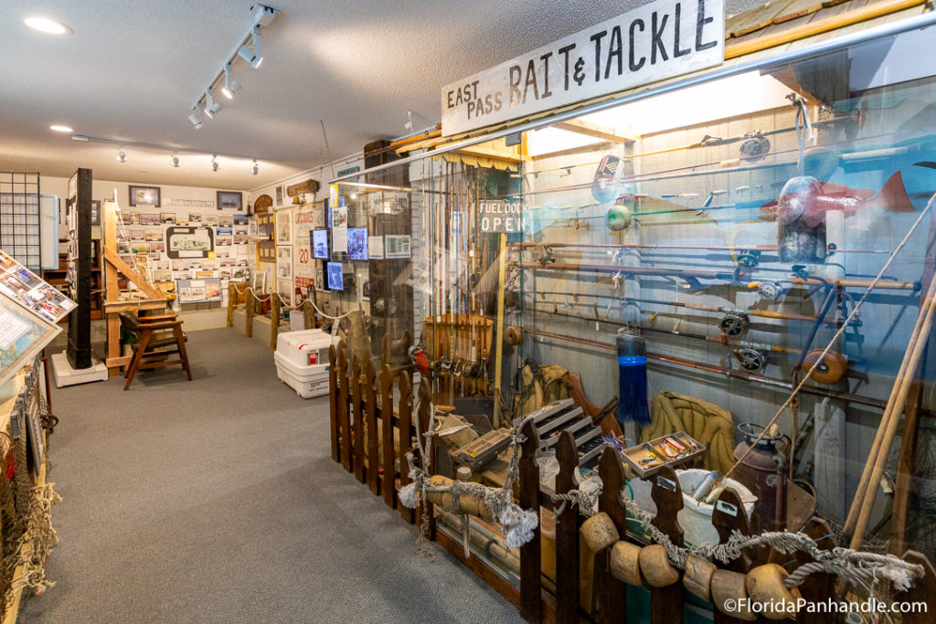 inside of a fishing museum with fishing gear and displays at Destins History Museum
