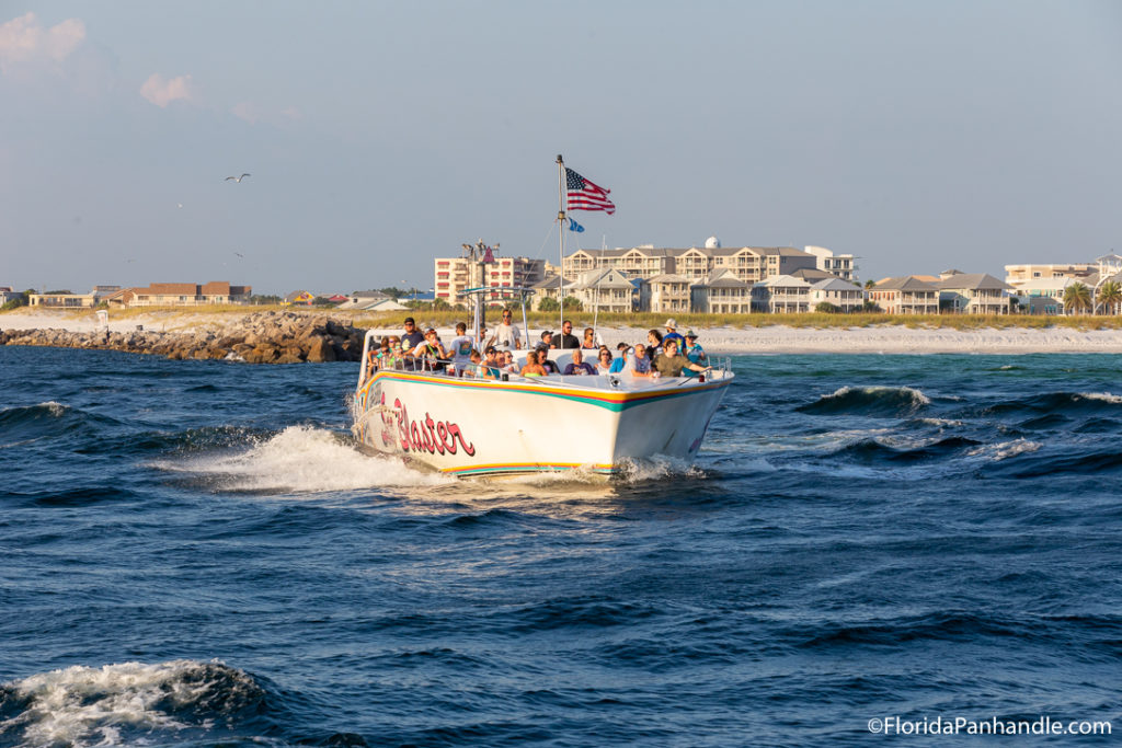 a boat take a large group of people in the water