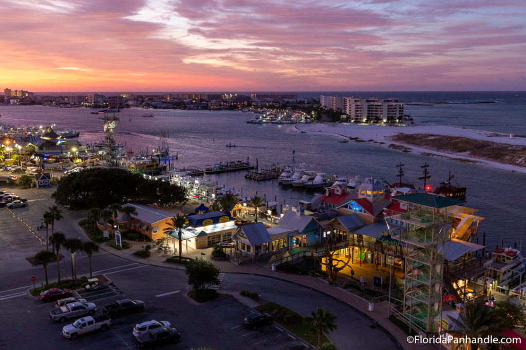 birds eye view of a little beach town during the sunset with purple hues in Destin, Florida