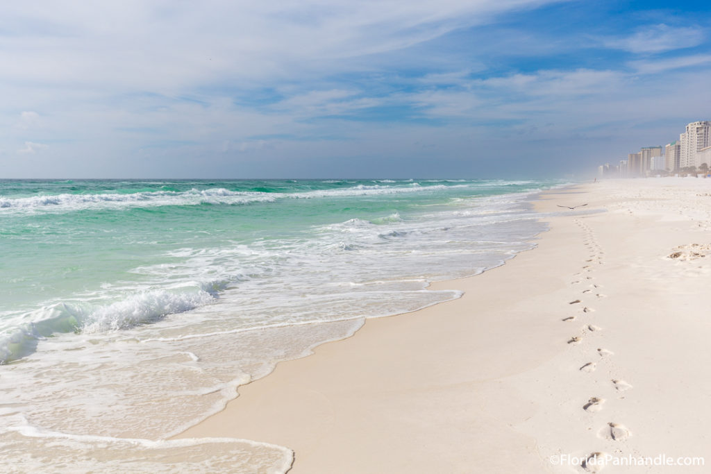 waves washing on to the shore on a sunny day in Destin, Florida