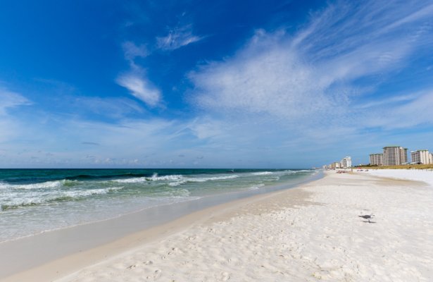 bright clear blue skies on a sunny day at the beach in Destin, Florida