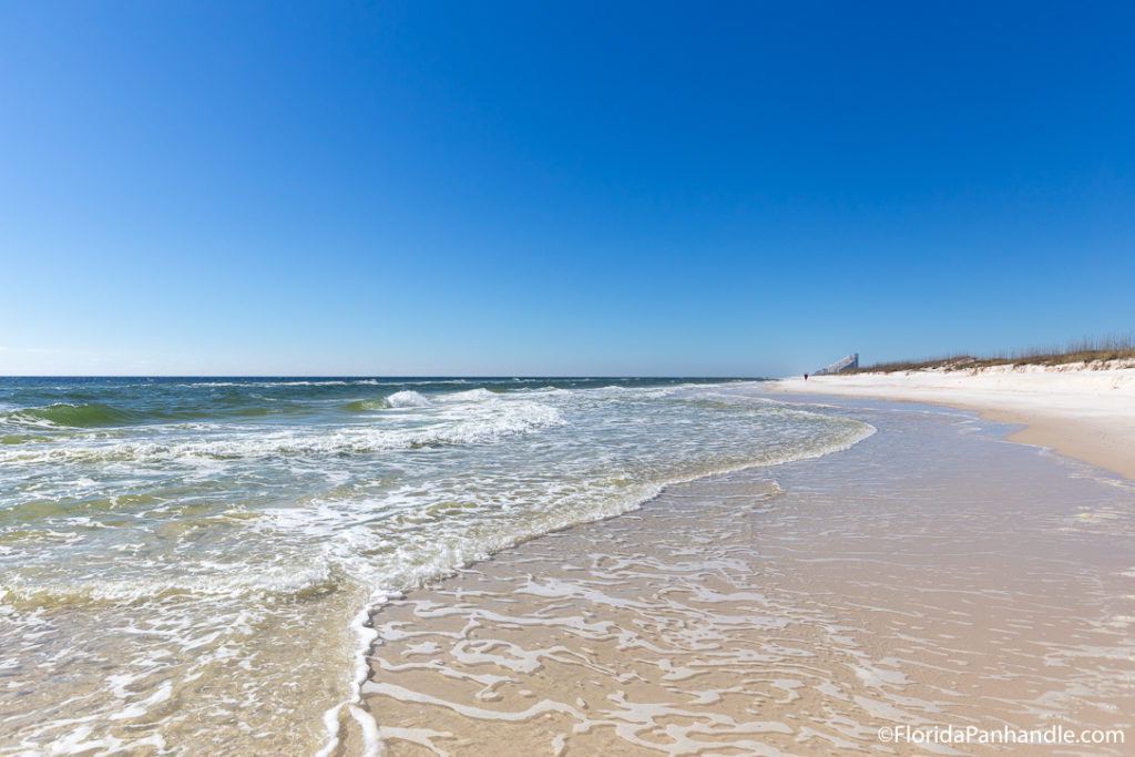 Waves washing away from the shore at Perdido Key State Park 