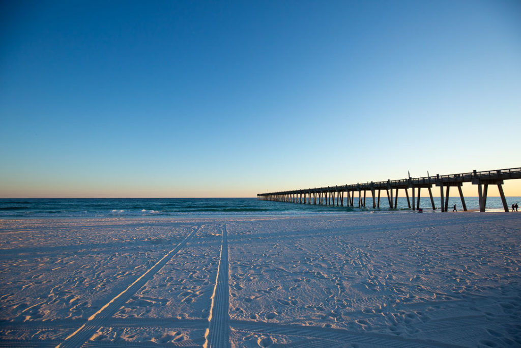 view of pensacola beach and pier during the sunset