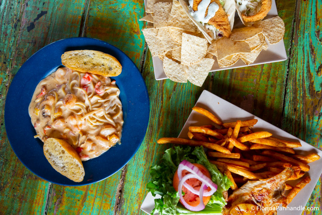 a plate of seafood pasta with two slices of bread on the side at Shaggy's