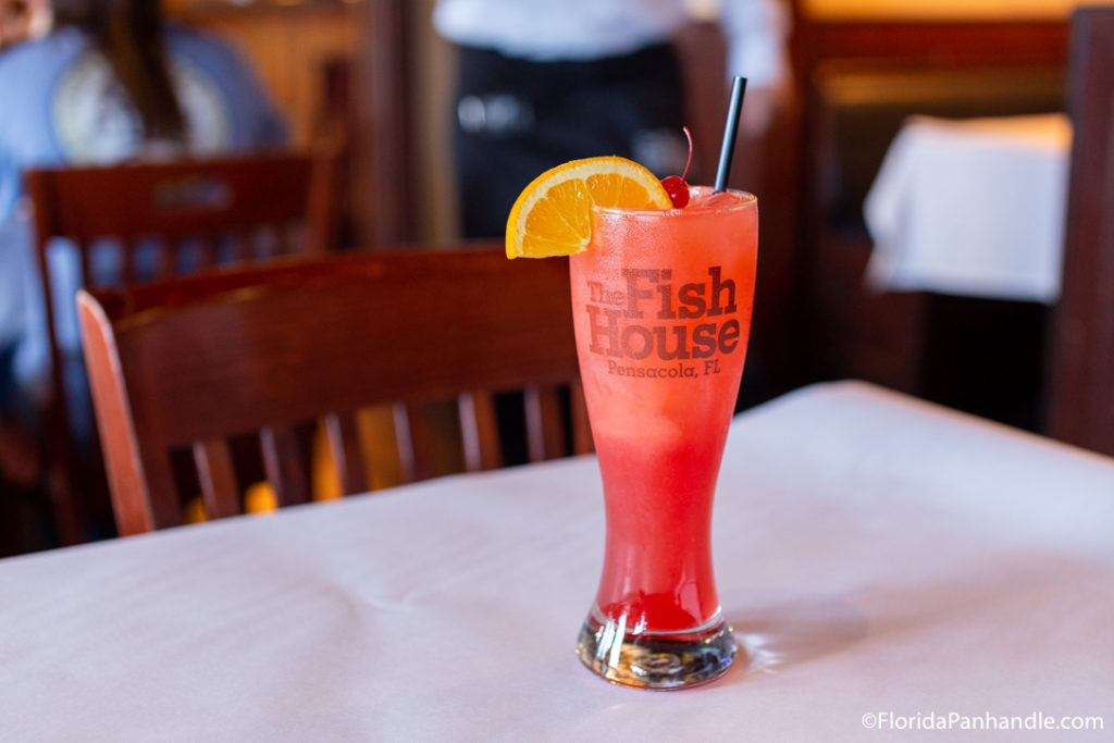 the fish house, pensacola, florida, cocktail, drink, red, orange slice, mimosa