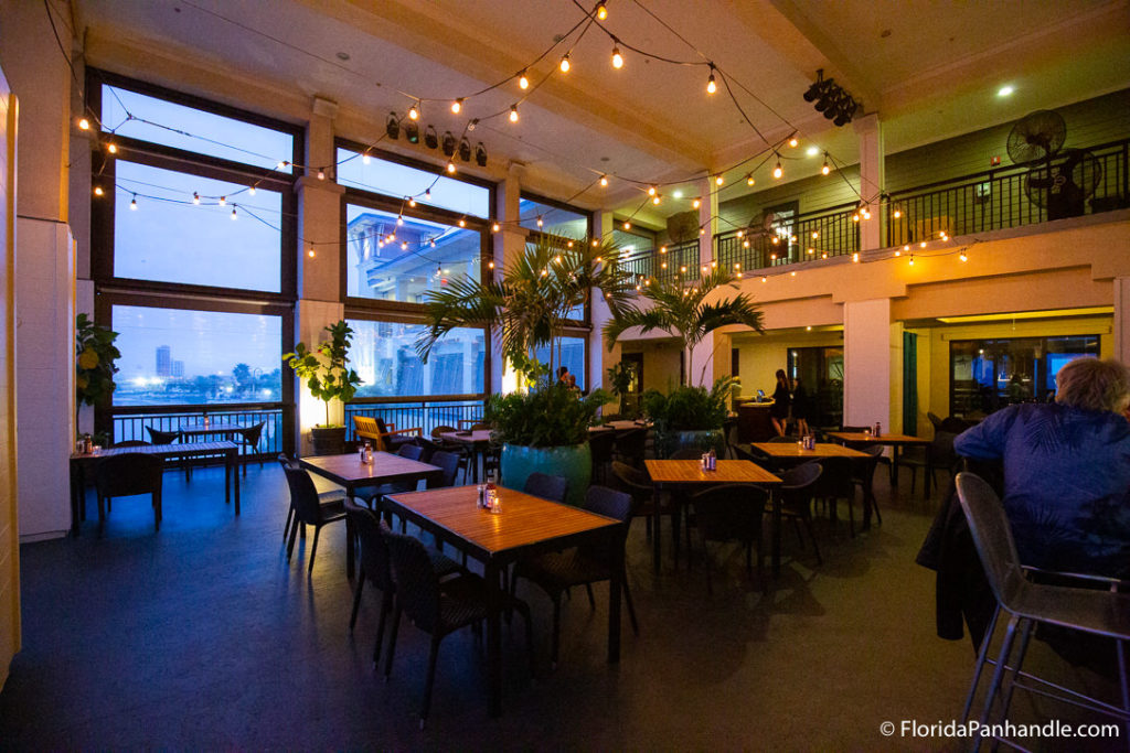 a dining room area with hanging lights  at The Grand Marlin