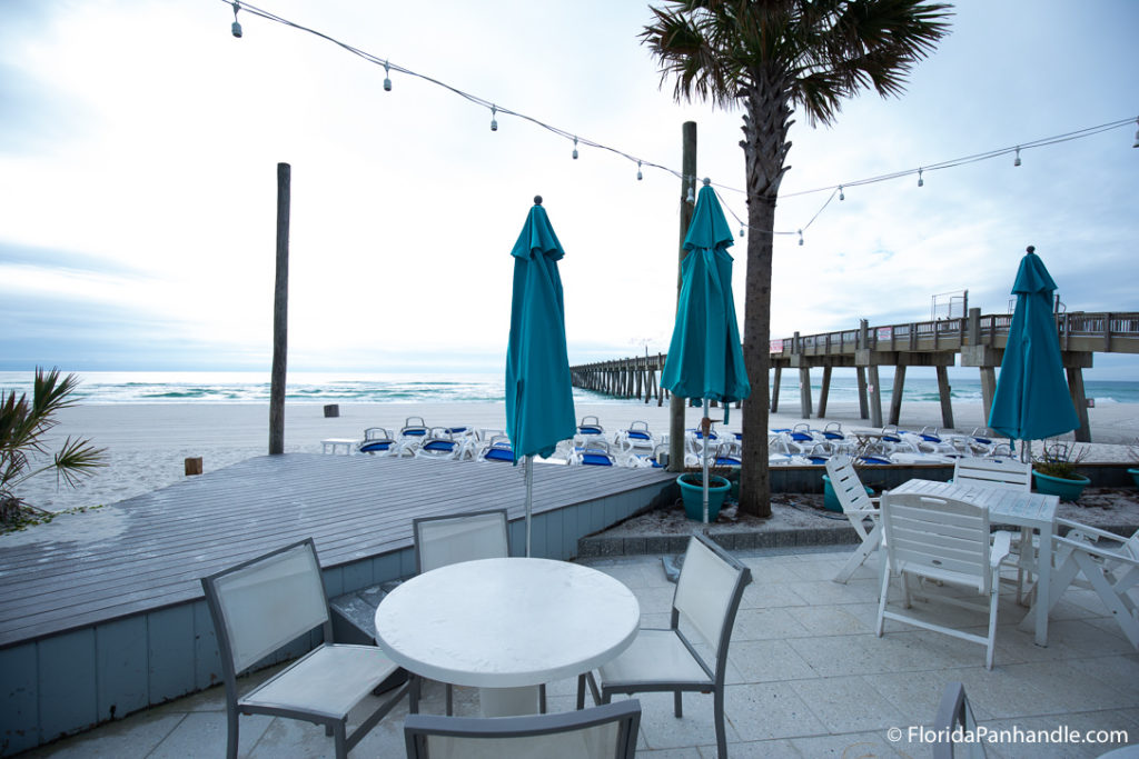 outdoor seating area on the beach at Casino Beach Bar and Grille in Pensacola Beach Florida