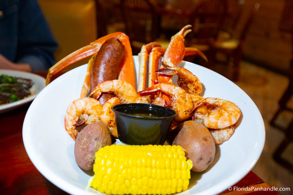 plate of crab legs, shrimp, potatoes, corn and sausage at Bayou Bill's in Panama City Beach