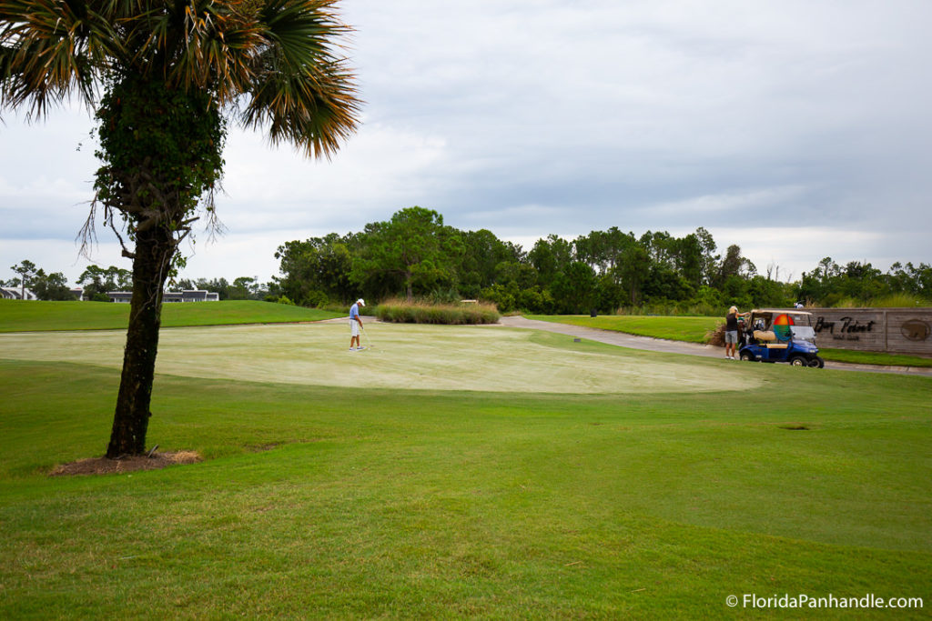 people playing golf at Bay Point Golf Club