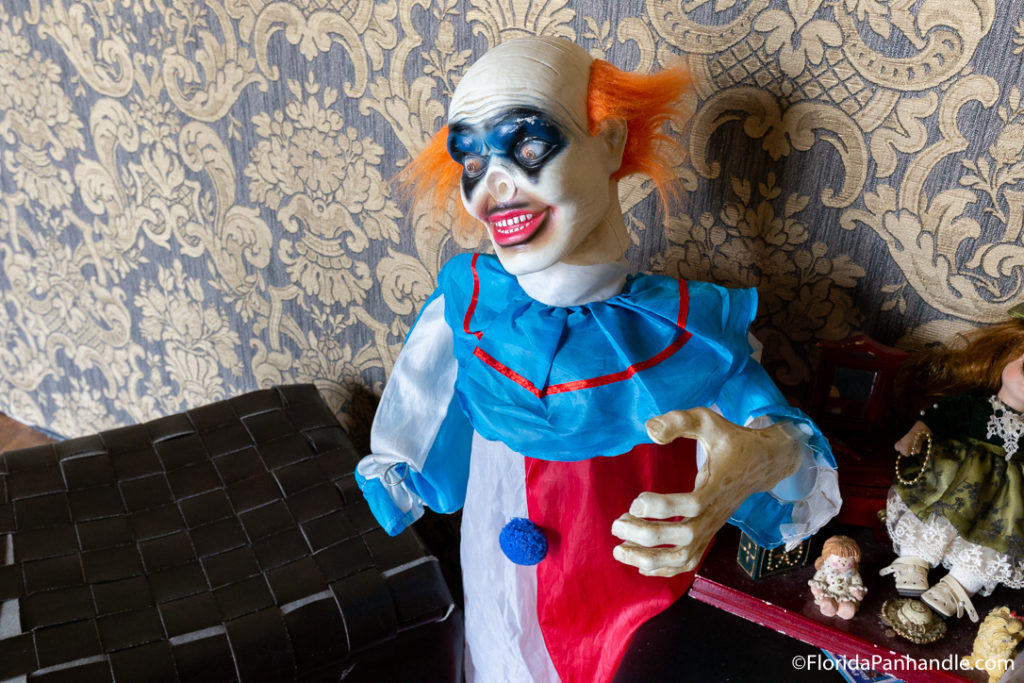 creepy clown with orange hair at gulf coast escape rooms