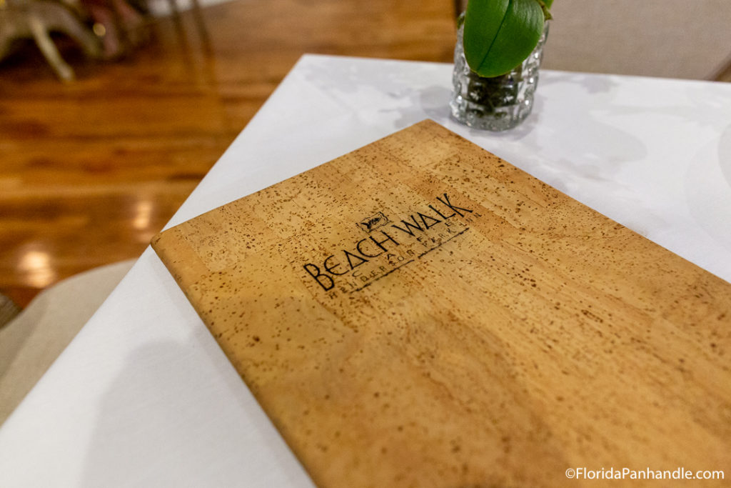 organic beach walk menu on top of white table cloth