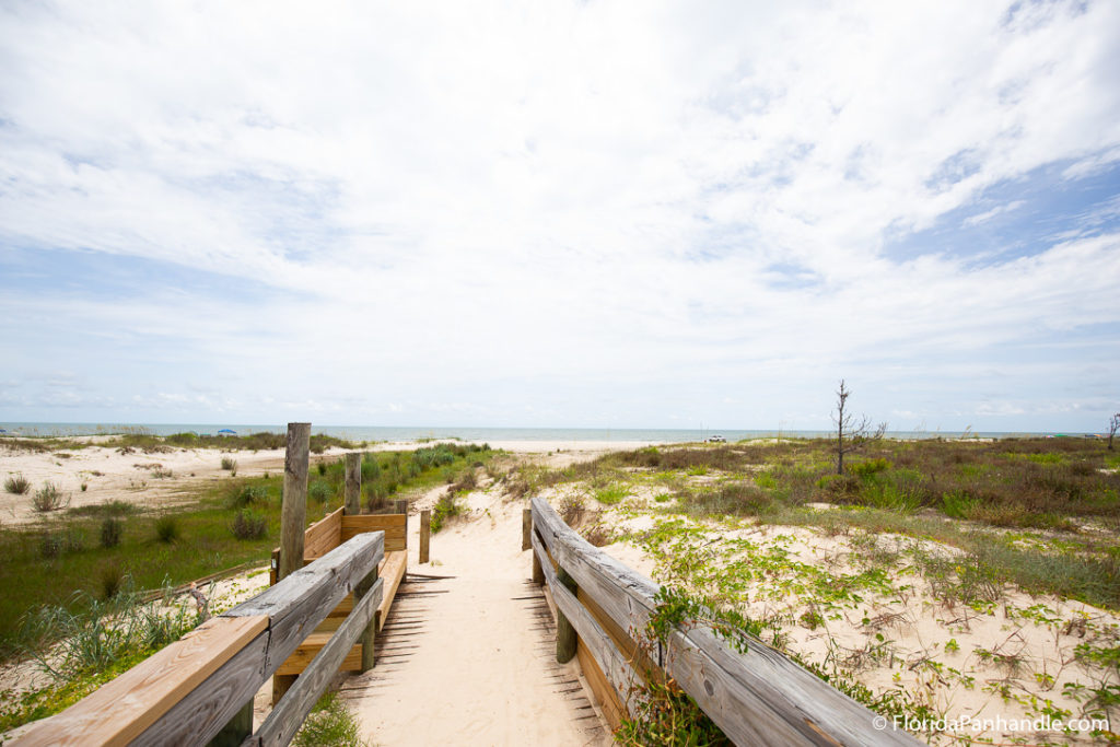 a pathway that leads to the beach