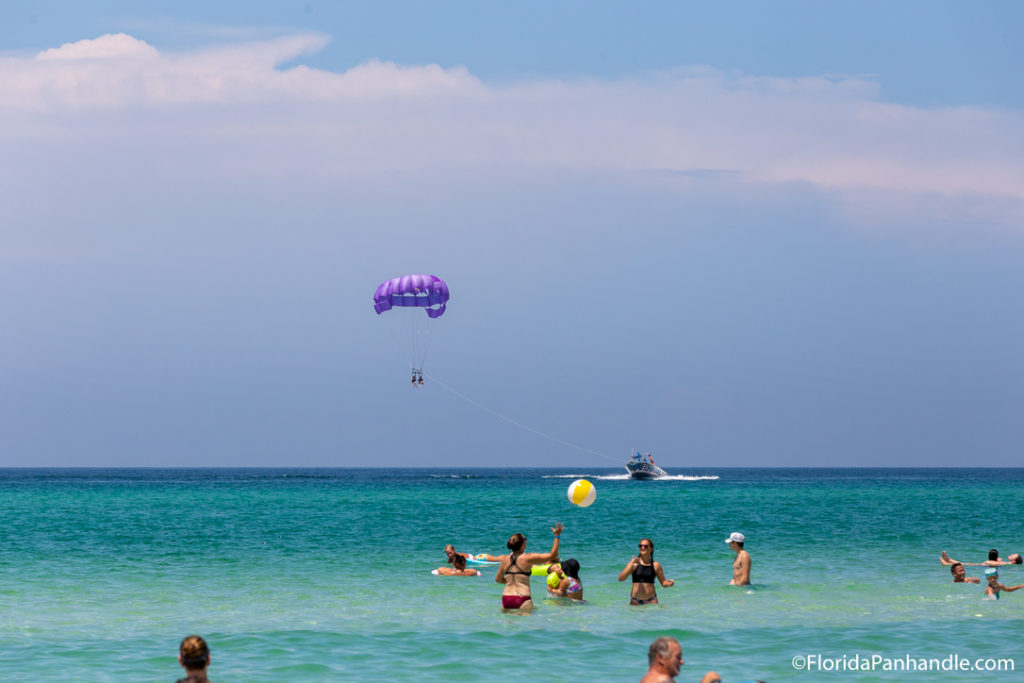 travel tips, panama city beach, people playing at the beach in the water