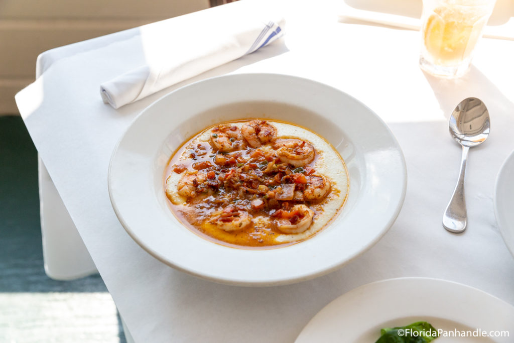 a bowl of shrimp and grits at Bud & Alley's Waterfront Restaurant in Florida