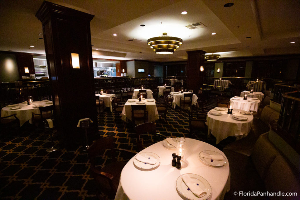 interior of seagar's prime steaks & seafood restaurant with white tablecloths on top of tables