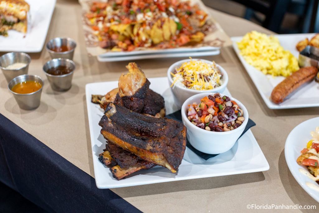 ribs next to loaded mashed potatoes and bean slaw at the aragon cafe