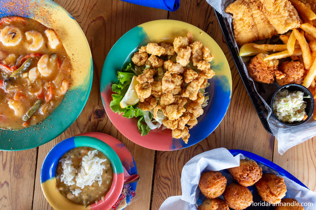 colorful plates at the oar house with rice and shrimp and other seafood treats