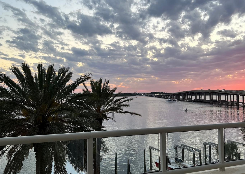 view of the bay, sunset, pink and purple skies