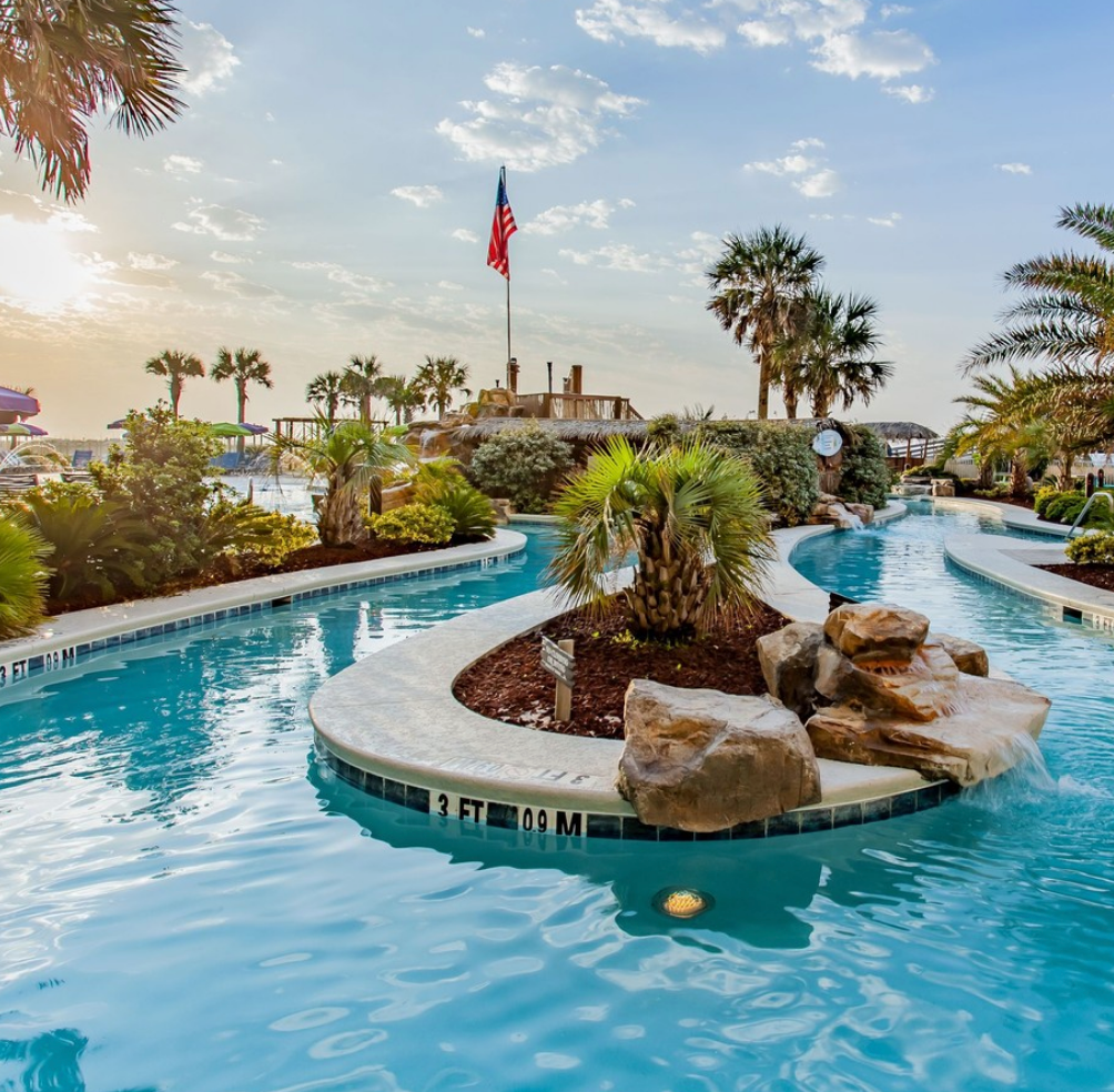 lazy river, resort style pool, palm trees