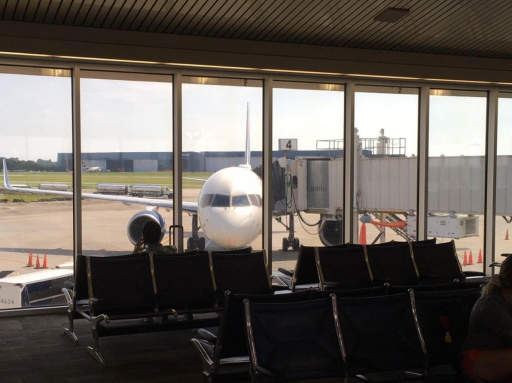 view of plane from inside the pensacola international airport