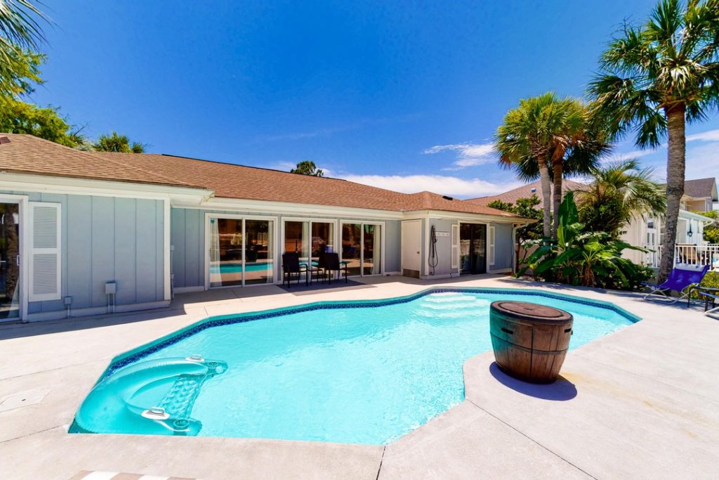 private pool in the backyard of a vacation rental house