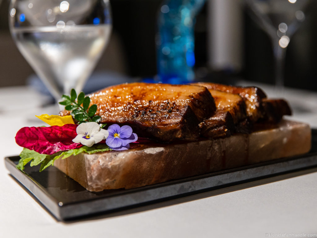 food on a salt rock with colorful flowers for decoration, Bonsai pensacola