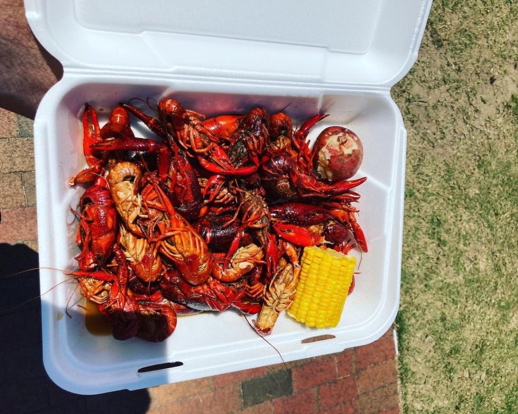 pensacola events, crawfish plate with a side of corn