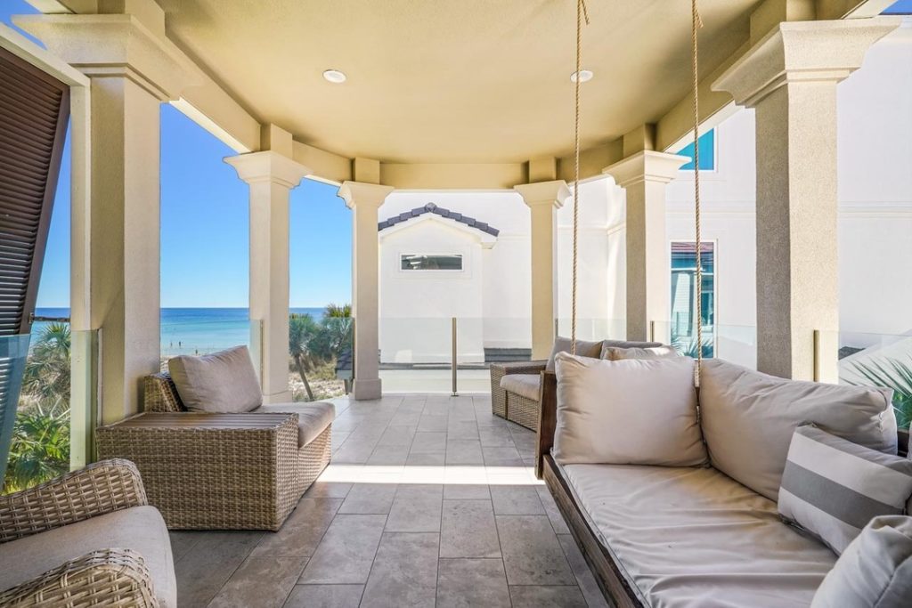 luxury vacation rentals in destin, couch swing, views of the beach, outdoor lounging area